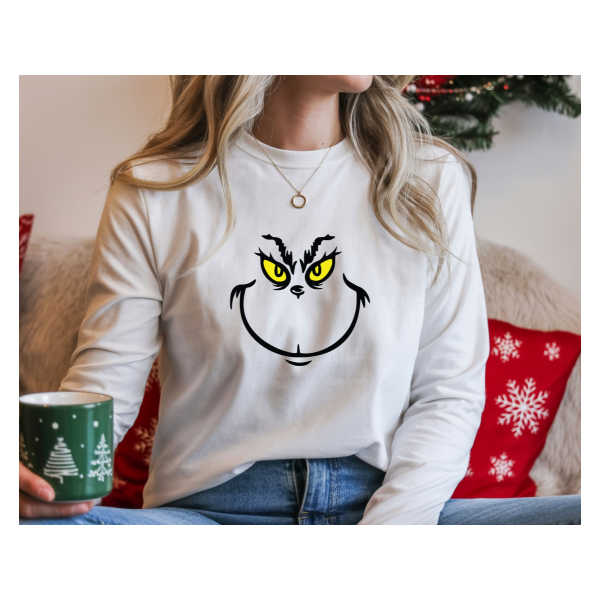 Grinch Smile Long Sleeve Tee — Mischievous Holiday Graphic Shirt