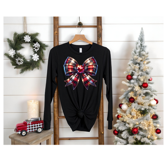 Plaid Holiday Bow Long Sleeve Tee — Festive Red & Black Ribbon Sparkle Graphic